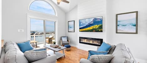 Open Concept Living Room overlooking the Bay with balconies on both sides