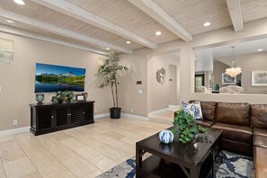 Living room which has an open concept to the kitchen area