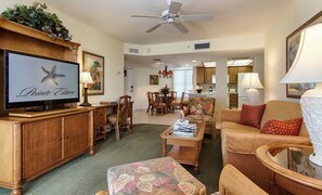 Find peace and relaxation with your close friends and family in this stunning living room featuring natural decor.