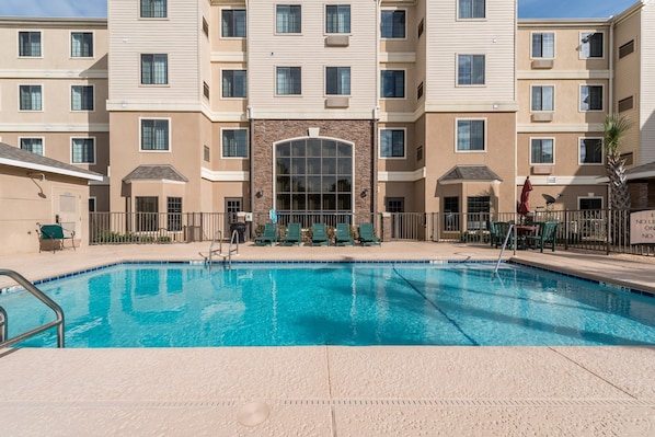 Spend time with family and friends in the outdoor pool during the summer.