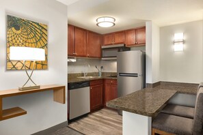 The fully-equipped kitchen features all the amenities you'd need to make a delicious meal.