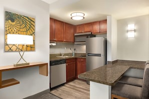The fully-equipped kitchen features all the amenities you'd need to make a delicious meal.