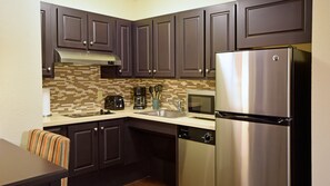 Prepare a meal in the equipped kitchen.