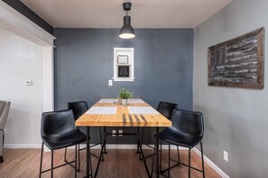 Bar-height table and chairs.