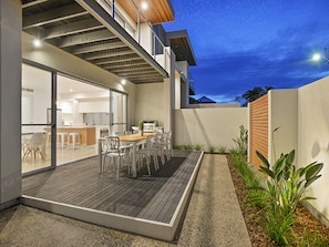 Outdoor dining area with bbq