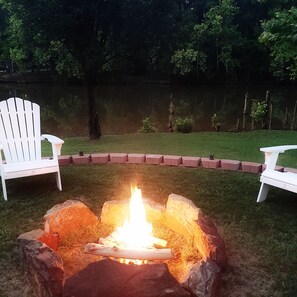 Natural stone firepit. Relax down by the water. Free firewood