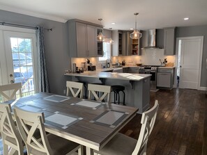 Dining room with bar and full kitchen