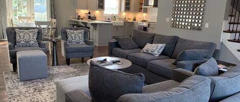 Living room - open floor plan with an abundance of natural light 