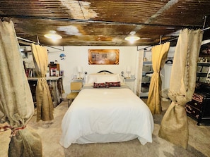 Country Suite with burlap privacy curtains.