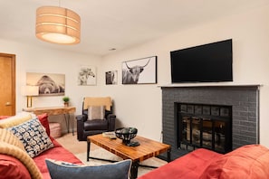 Living Room- sofa, seating, fireplace, tv