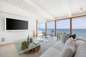 Watch the stunning view or your favorite movie from the cmfortable living room couch.