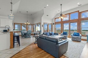 The third level of this home is the pièce de rèsistance of the home’s communal spaces, an open layout where everyone can gather in luxurious comfort.