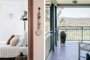 Master bedroom with view over national park and beach