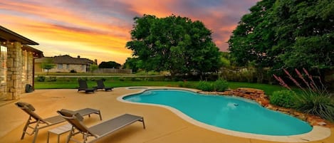 Beautiful Backyard with private pool and hot tub. Pool toys and towles provided!