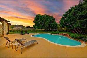 Beautiful Backyard with private pool and hot tub. Pool toys and towles provided!