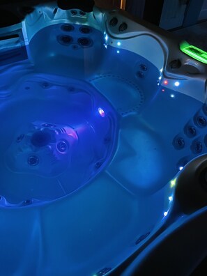Relax in the Hot tub with the gazebo lights off to make it a little more private