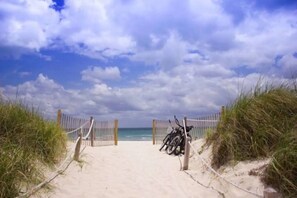 Directly on the beach, just walk out building back door