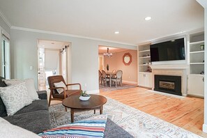 Whether watching TV or reading a book by the built-in gas fireplace, you’ll love using this room as your main gathering place.
