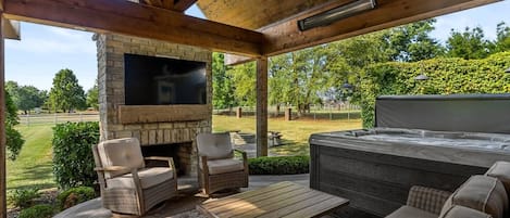 Gorgeous back deck which includes priceless view, comfy furniture, 60 inch tv and hot tub. Great place to relax and unwind. 