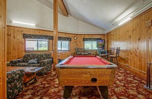 Common area with game area and pool table