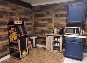 Ms. Pac Man arcade game with 14 different games and a coffee bar. 