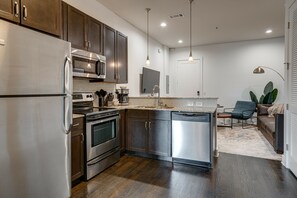 Fully equipped kitchen with stainless steel appliances