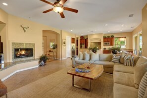 Living area features a fireplace.