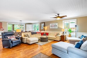 Upper level family room connects to dining area and kitchen
