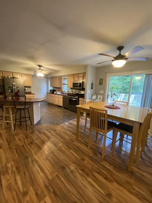 Fully equipped kitchen! Walk right out to have a BBQ on the porch! 