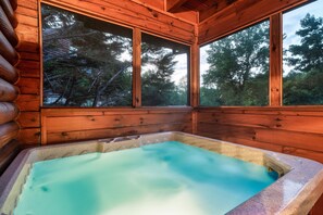 The private hot tub is ready for you to enjoy after a long day of hiking