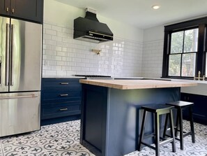 Chef's Dream Kitchen with Viking stove, marble + maple countertops 