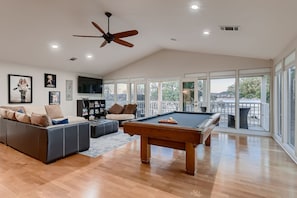 Main House Upper Level Game Room with a Pool Table, Smart TV, Foosball Table, Deck and Views
