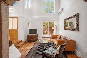 Living room view showcasing large windows