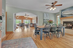 Enjoy meals together at the dining table, perfect for family dinners and gatherings.