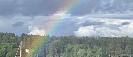 Pot of gold at the end of the rainbow, from atop private stairs to the beach.