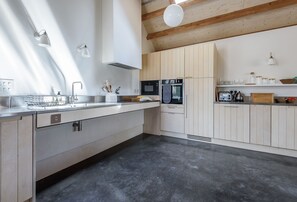 Kittwhistle, near Dorchester: Accessible appliances in the well-planned kitchen