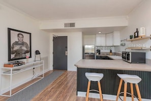 Fully equipped kitchen for all of your needs! Drip coffee maker, dishwasher, seating for 4 at the kitchen counter, cooktop, toaster oven + more.