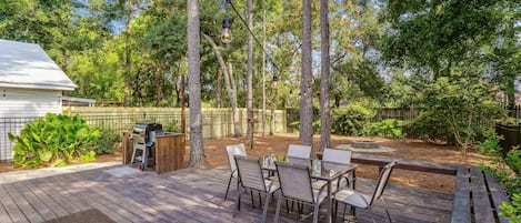 Huge backyard with plenty of seating and a pellet grill!