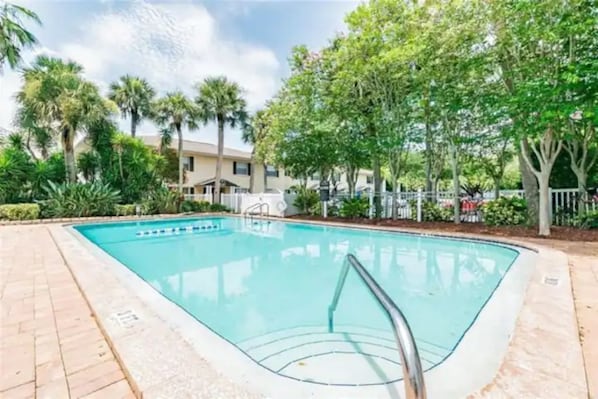 Swimming pool steps away from the apartment 