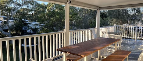 Alfresco dining area which can become fully enclosed with the roller blinds. 