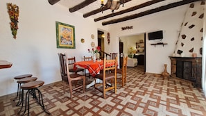 Dining Room with Open Kitchen Plan and fire place (only decoration :)