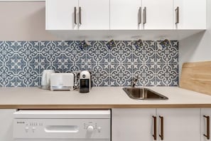 Tiled Galley Kitchen w dishwasher and microwave