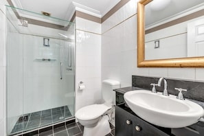 Fully Tiled Bathroom w frameless glass screen