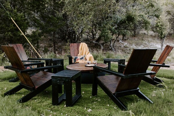 Custom Adirondacks under canopy of trees for star gazing