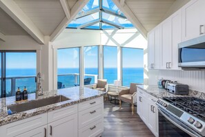 Kitchen nook with glass ceiling.