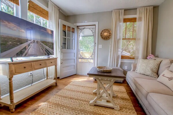 Main entrance into the guest apartment via outdoor stairs leading to living area