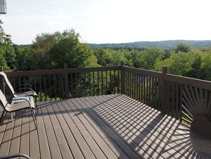 OVERALL:  The large deck with the surrounding hills in the background.