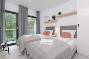 Two comfortable single beds in the bedroom.