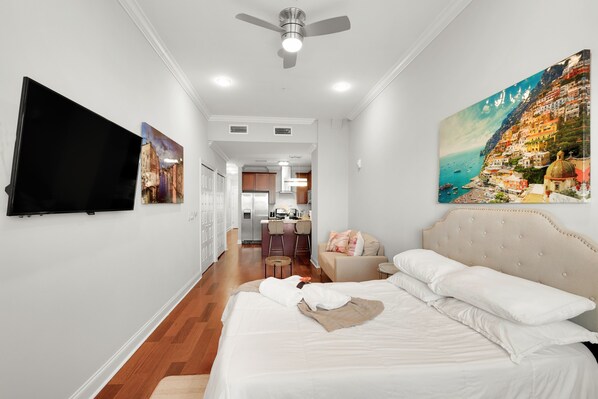 Very nice stylish 700+sq ft LOFT Studio Apt full of amenities, Rooftop pool, Fitness Center in the building, in-unit washer dryer, motorized shades and plenty of comforts.  Reliable WIFI included as well.
