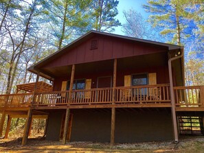 The Front of the Cabin showing Side Deck with Outdoor Seating and Hot Tub